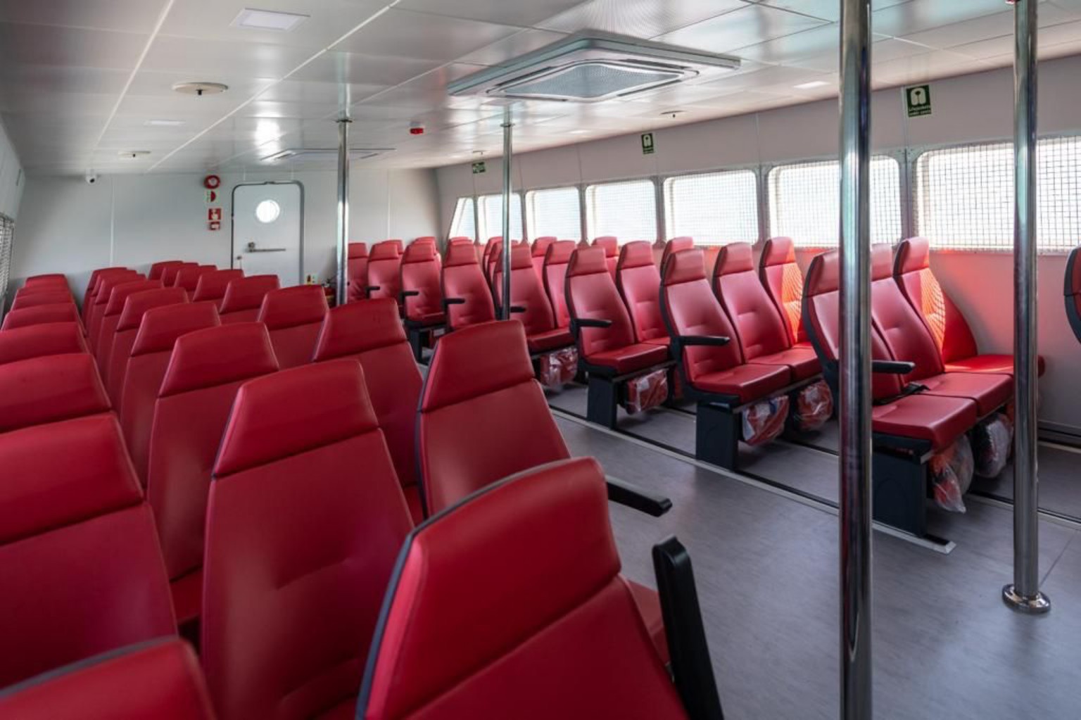 Passenger seating inside a marine personnel vessel